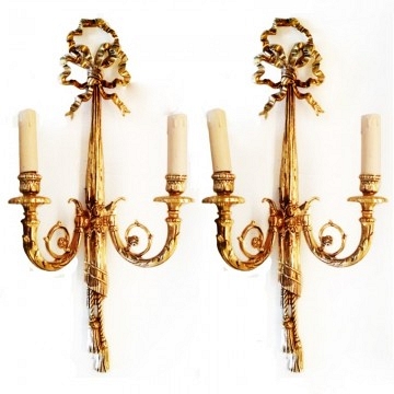 Elegant pair of Neoclassical bronze Two-Arm Wall Sconces